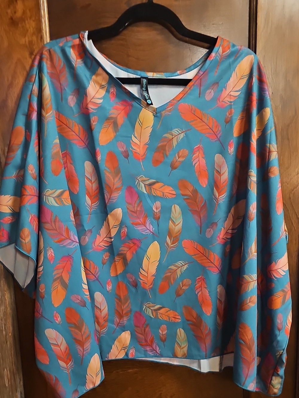 Women's Teal Feather Print V-Neck Top